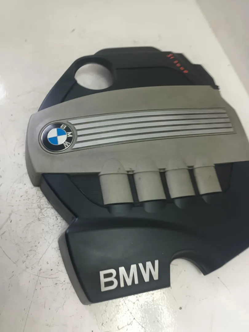 COPRIMOTORE con codice 1114 7797410-04 da BMW Serie 1 Serie (E87) (07>) 2000 Diesel (2009)